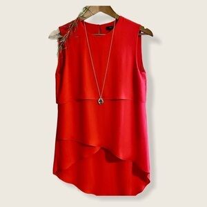 BCBG Sleevless Blouse in deep red, tiered, asymmetrical.